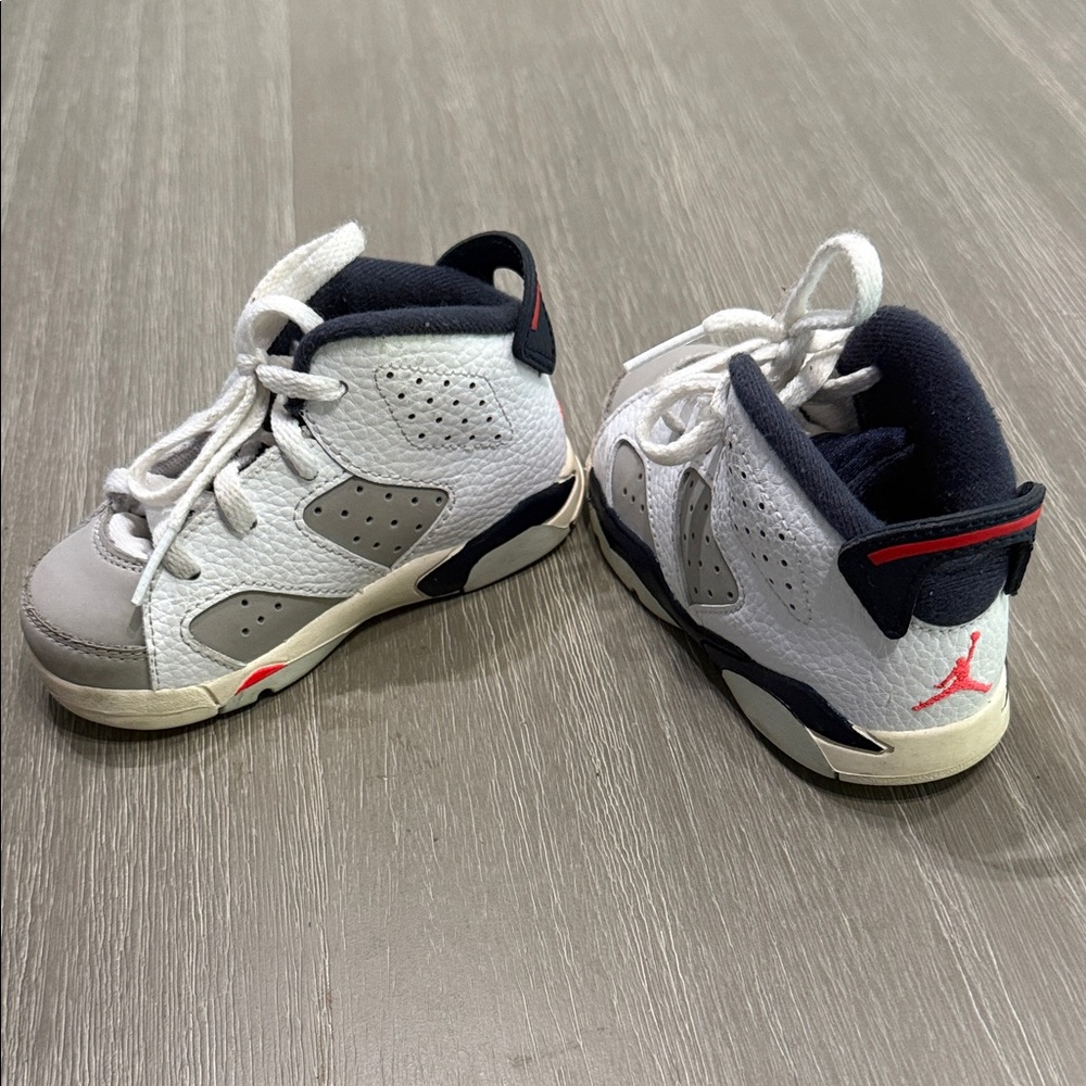 Jordan Kids White and Gray Sneakers with Red Accents